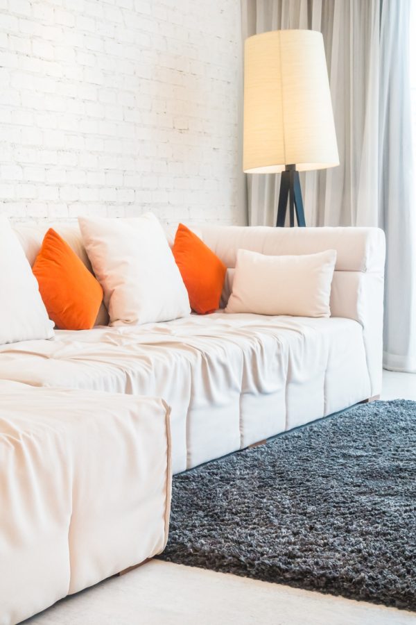 couch-with-white-orange-cushions