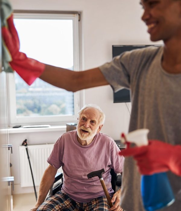 volunteer-helping-disabled-person-clean-his-home